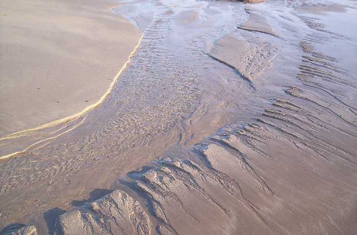 All sorts of water movements patterning the sands.